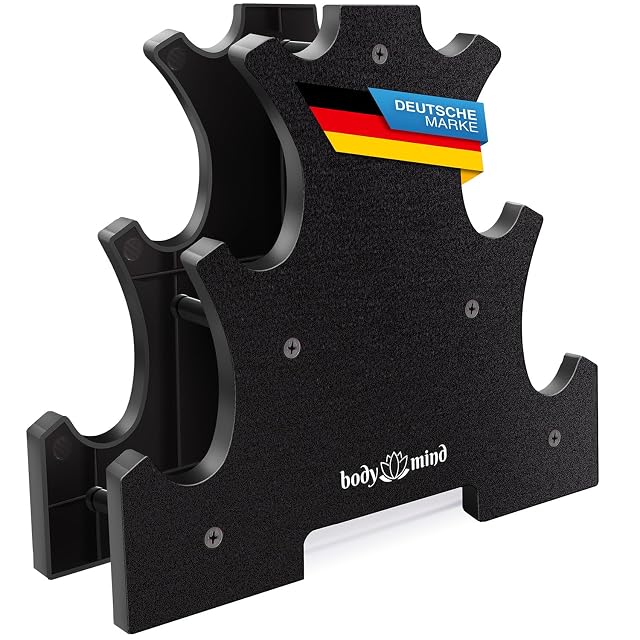 Body & Mind empty three-tier stand in textured black, cradles cut into each shelf, a Deutsche Marke flag on top