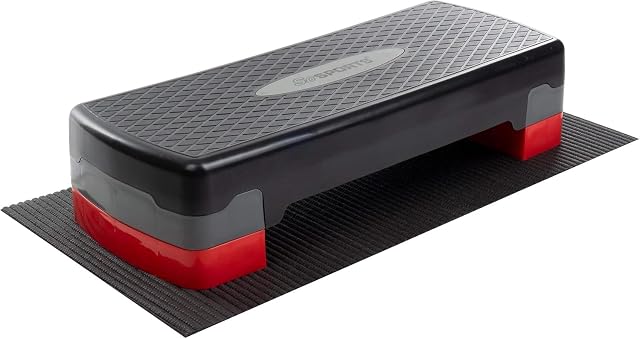 ScSPORTS aerobic step board with textured surface and a protective floor mat